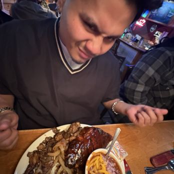 Texas Roadhouse - Birthday boy enjoying his food - American Near Me - Corona, California Texas Roadhouse - Birthday boy enjoying his food - American Near Me - Corona, California