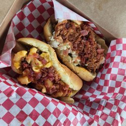 Dag On Country Store - "Mike Lowe RIP" Dog topped with pork BBQ, chili, slaw, and bacon and a "Spanky" Dog topped with mac & cheese, bacon