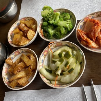 Chin Hills - a variety of asian dishes on a table - Korean Near Me - Kenmore, New York