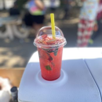 Micheladas el Barbas - a drink in a plastic cup - Juice Bars & Smoothies Near Me Micheladas el Barbas - a drink in a plastic cup - Juice Bars & Smoothies Near Me