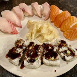 House of Sushi - Dinner spread. (Nigiris);2 Japanese red snapper, 4 yellowtail, 4 salmon.   A requested ton of ginger, and a Eel cucumber roll w/ eel sauce.