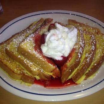 IHOP - French toast with strawberries. I give this 5 years. I even got an extra bowl of strawberries. Very happy. - Breakfast & Brunch Near Me - Bakersfield, California