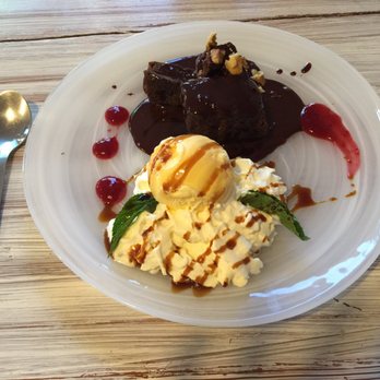 Albahaca - A classic warm brownie served with walnuts, vanilla ice cream, then drizzled with chocolate and raspberry sauce. Top notch! - Mediterranean Near Me - Las Lagunas de Mijas, Massachusetts Albahaca - A classic warm brownie served with walnuts, vanilla ice cream, then drizzled with chocolate and raspberry sauce. Top notch! - Mediterranean Near Me - Las Lagunas de Mijas, Massachusetts