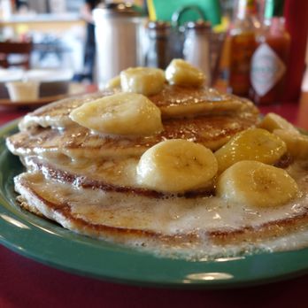 Squeeze In - Jack Johnson Banana Walnut Pancakes – Buttermilk Pancakes with Walnuts Cooked inside, topped with Bananas sautéed in Butter and Honey - American Near Me - Las Vegas, Nevada Squeeze In - Jack Johnson Banana Walnut Pancakes – Buttermilk Pancakes with Walnuts Cooked inside, topped with Bananas sautéed in Butter and Honey - American Near Me - Las Vegas, Nevada