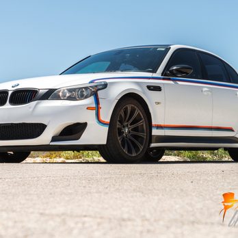 Incognito Wraps - M5 in Satin White and Chrome M stripes.  Carbon Fiber Roof, Mirrors and accent piecies. - Vehicle Wraps Near Me - Las Vegas, Nevada