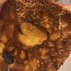 Pizza Perfect Bellevue - The burnt crust. I forgot to mention my wife couldn't cut it with a knife