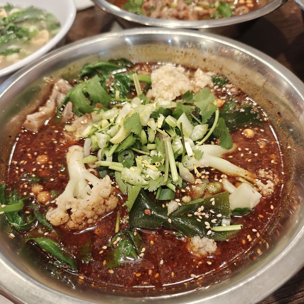 Signature hotpot with meat and vegetables Signature hotpot with meat and vegetables