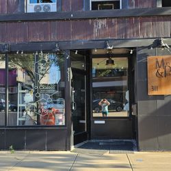 Mud & Prints - Studio and Gallery with local artists and ceramic classes.  We specialize in custom mugs for businesses