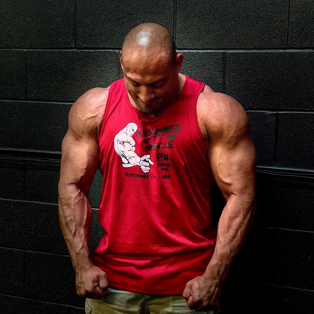 Punctuating the MUSCLE in World Famous Kissimmee Muscle 24 hour gym is