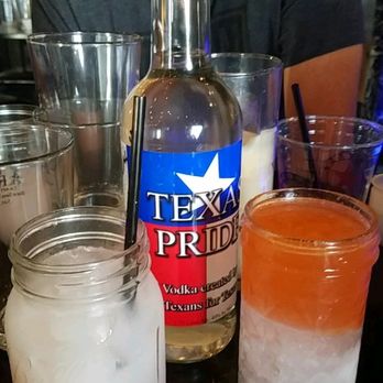 Artisan Craft Bar - Our own bottled and labeled vodka and the coconut drink and a moonshine old fashion. - Distilleries Near Me - San Antonio, Texas