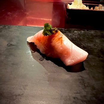 Sushi Pop - Hamachi-toro: jalapeño pepper sauce, cilantro (fresh and spicy with an enjoyment that results in silence) - Sushi Bars Near Me - Oviedo, Florida Sushi Pop - Hamachi-toro: jalapeño pepper sauce, cilantro (fresh and spicy with an enjoyment that results in silence) - Sushi Bars Near Me - Oviedo, Florida