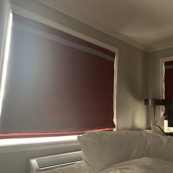 Minerals Hotel - Light shining through the blackouts everywhere. - Hotels Near Me - Vernon, New Jersey