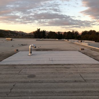 Everest Roofing - Repair patch done on leaking roof in Livermore factory. - Roofing Near Me