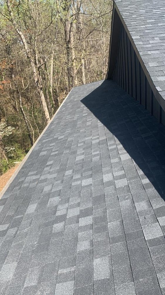 Slide of E. Thompson Roofing