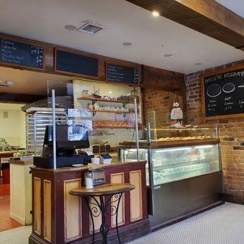 Au Kouing-Amann - Interior with menus - Bakeries Near Me - Montreal, Quebec