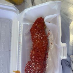 Korean corn dog. Coat: Cheetos, filling: mozzarella.