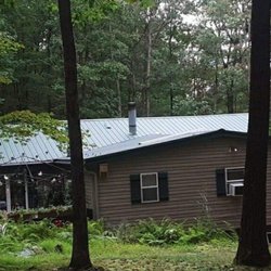 TWS Roofing - WhiteHaven Pa Green textured metal roof install.