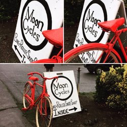 Moon Cycles - Our sign and red bike.