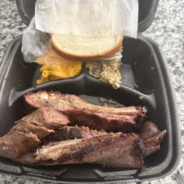 Ribs, sausages, brisket, dirty rice and Mac n cheese Not a full plate!!! They give you a lot Ribs, sausages, brisket, dirty rice and Mac n cheese Not a full plate!!! They give you a lot