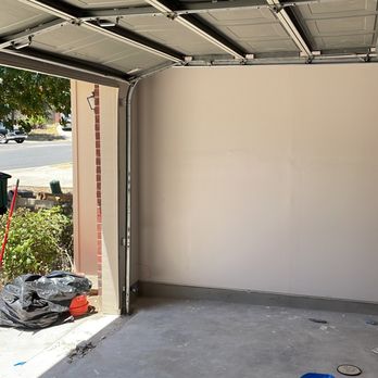 Garcia Infinite Flooring - the inside of a garage - Flooring Near Me