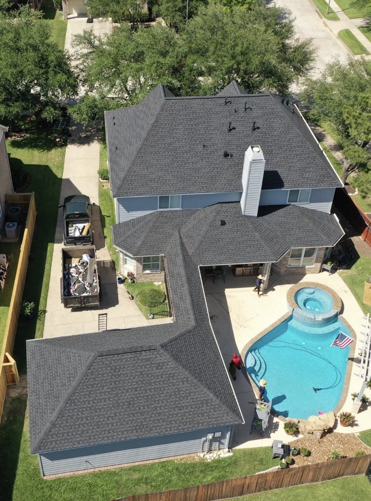 Slide of Lone Star Roofing