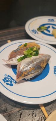 Kura Revolving Sushi Bar by null