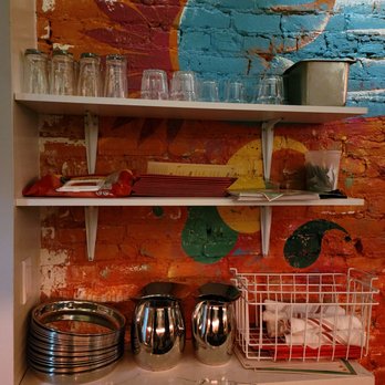 Masalawala & Sons - a kitchen with a brick wall - Indian Near Me - Brooklyn, New York Masalawala & Sons - a kitchen with a brick wall - Indian Near Me - Brooklyn, New York