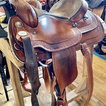 Indiana Harness - Custom off billets, back Cinch and stirrups all hand tooled and oiled to match this saddle rehab. - Leather Goods Near Me - Spokane Valley, Washington Indiana Harness - Custom off billets, back Cinch and stirrups all hand tooled and oiled to match this saddle rehab. - Leather Goods Near Me - Spokane Valley, Washington
