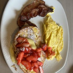 Strawberry croissant French toast with scrambled eggs and bacon Strawberry croissant French toast with scrambled eggs and bacon