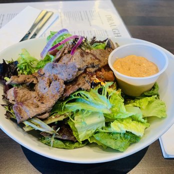 The Brass Tap - Tap salad with steak and a side of cowboy sauce - Beer Bar Near Me - Modesto, California