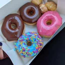 a variety of donuts in a box