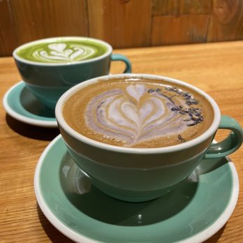 Outro - Back: Matcha Latte. Front: Lavender Latte. - Cafes Near Me - New York, New York
