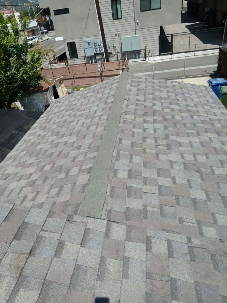 Slide of R & S All American Roofing