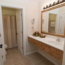 Beaufort Harbour Suites - Bathroom vanity with separate shower and toilet area