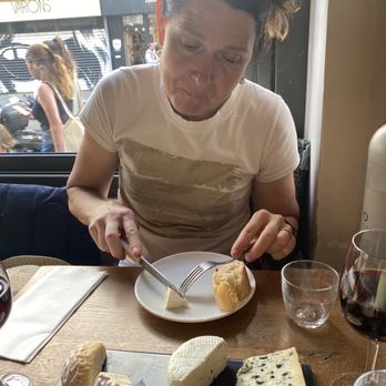 MONBLEU Faubourg Montmartre - Aimée enjoying the truffle cheese with the onion purée - French Near Me - Paris, 75 MONBLEU Faubourg Montmartre - Aimée enjoying the truffle cheese with the onion purée - French Near Me - Paris, 75
