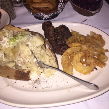 Clearman's Steak 'N Stein - Fillet mignon.. Baked potatoe and onion rings - Steakhouses Near Me - Pico Rivera, California