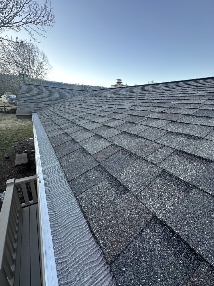 Slide of Golden Shield Gutters