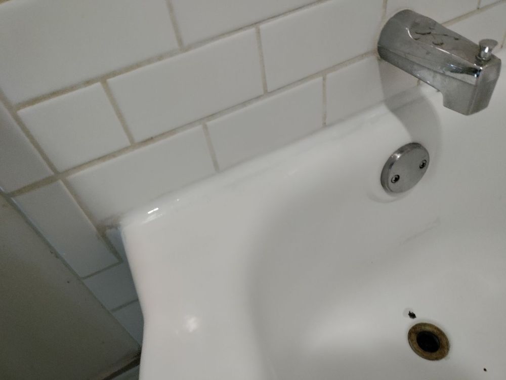 Slide of Pro Bath & Shower Caulking