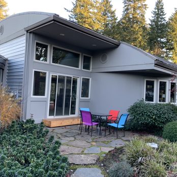 Multipurpose Construction - a patio with a table and chairs - General Contractors Near Me Multipurpose Construction - a patio with a table and chairs - General Contractors Near Me