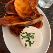 Photo of Dylan's Oyster Cellar - Baltimore, MD, United States. Potato skins