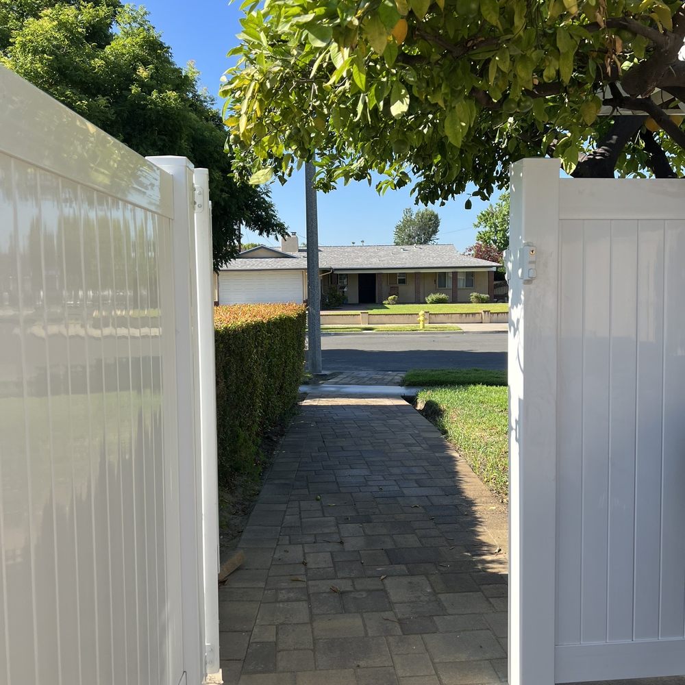 Unique Home Builders - Added paver walkway to the street for the trash cans and vinyl fence and gate. - Masonry/Concrete Near Me - Encino, California