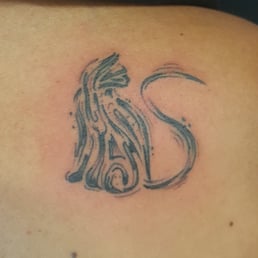 Cat tattoo done by Cesy.