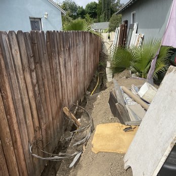 California Star Construction - ADU Disaster - trench was left open for months and remains open. The fence started to sag. - Roofing Near Me - Long Beach, California