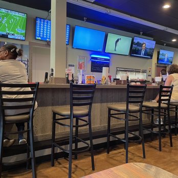 Bud's Tavern - Inside bar with booths across, lots of TV's - American Near Me - Louisville, Kentucky Bud's Tavern - Inside bar with booths across, lots of TV's - American Near Me - Louisville, Kentucky