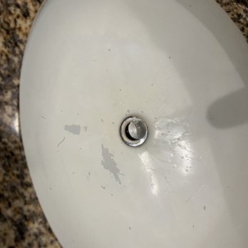 Pacific Inn - Bathroom sink with yellow stains and dirty. - Hotels Near Me - Grover Beach, California