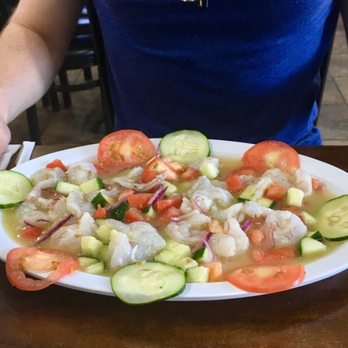 Taqueria El Chimuelo 2 - Aguachile verde -- spicy raw shrimp in lime with tomatoes, cucumbers and onion - Mexican Near Me - Burlington, North Carolina Taqueria El Chimuelo 2 - Aguachile verde -- spicy raw shrimp in lime with tomatoes, cucumbers and onion - Mexican Near Me - Burlington, North Carolina