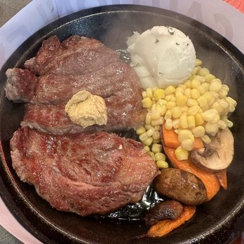 Sizzlin’ Place - Rib eye with rice comes with mashed potatoes and veggies. This was so filling, I did not need the rice. - Noodles Near Me - Rancho Cucamonga, California Sizzlin’ Place - Rib eye with rice comes with mashed potatoes and veggies. This was so filling, I did not need the rice. - Noodles Near Me - Rancho Cucamonga, California