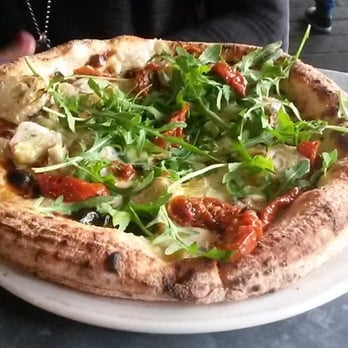 Pizza East - Artichoke, rocket, tomato and marjoram pizza - Pizza Near Me - London, XGL Pizza East - Artichoke, rocket, tomato and marjoram pizza - Pizza Near Me - London, XGL