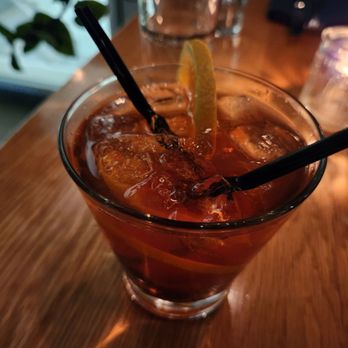 Graze - a glass of iced tea with a lemon wedge - New American Near Me - Madison, Wisconsin Graze - a glass of iced tea with a lemon wedge - New American Near Me - Madison, Wisconsin
