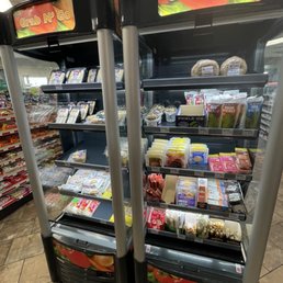 two refrigerators in a grocery store